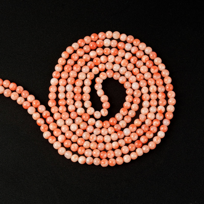 Angel Skin Coral 3.3-3.4mm rounds, natural, undyed, handcut. Pre-1970's. Pkg 30. B4-cor474