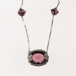 Art Deco pendant necklace, amethyst glass with floral bezel j-NLAD991