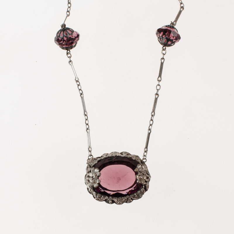 Art Deco pendant necklace, amethyst glass with floral bezel j-NLAD991