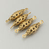 Antique finish 14k gold plated brass filigree oval 2 ring connector beads, 26x7mm. Pkg of 4. b9-2256g