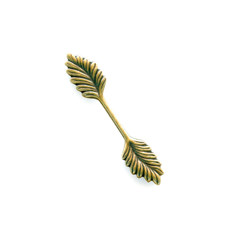 Fold over bail with leaf design. Antique gold finish over solid brass. 35x5mm. Pkg. of 4. b9-2299