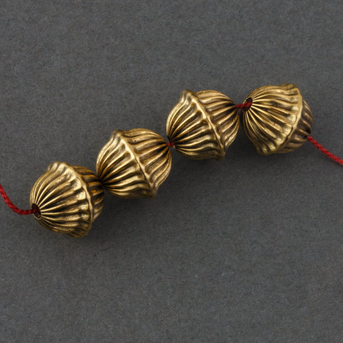 Oxidized brass fluted melon bead with rim at the equator. 12mm Pkg 6. B18-0119