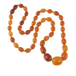 Baltic yellow Amber necklace. Oval butterscotch graduated beads. 22 in. 1910 1920's. j-nlbd2183