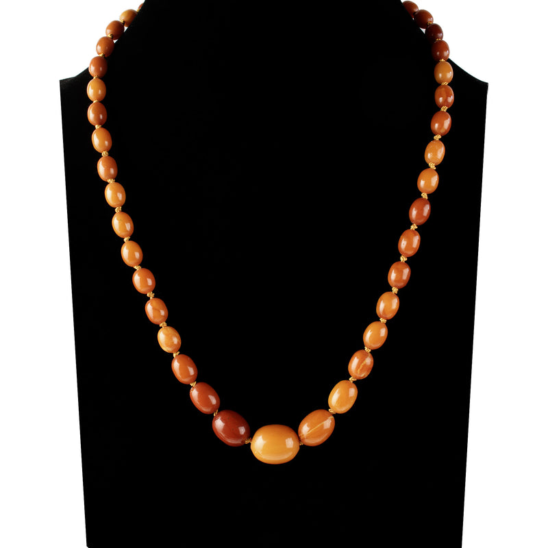 Baltic yellow Amber necklace. Oval butterscotch graduated beads. 22 in. 1910 1920's. j-nlbd2183