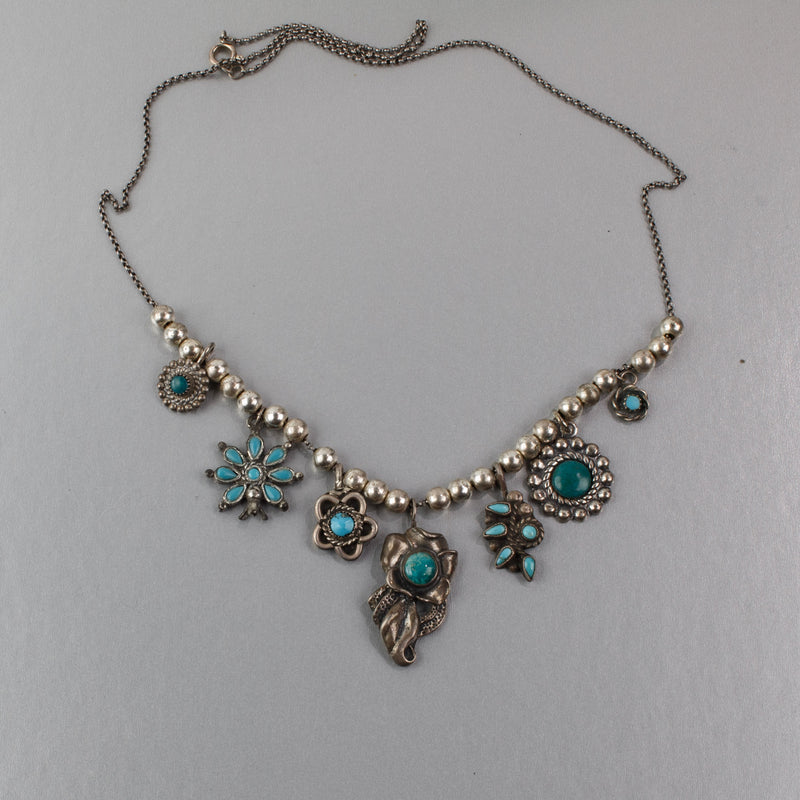 Southwestern Turquoise blue and silver concho necklace. nlvs750