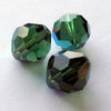 Vintage West German tin cut tourmaline green AB 12x10mm. Pkg of 2. 